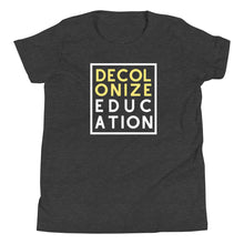 Load image into Gallery viewer, Decolonize Education Youth Short Sleeve T-Shirt | Paperbacks & Frybread Co. - Paperbacks & Frybread Co.