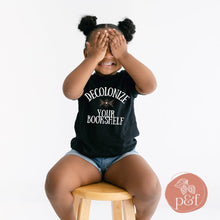 Load image into Gallery viewer, Decolonize Your Bookshelf Toddler Short Sleeve Tee | Paperbacks & Frybread Co. - Paperbacks & Frybread Co.
