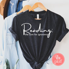 Load image into Gallery viewer, Reading The Cure For Ignorance Shirt | Paperbacks & Frybread Co. - Paperbacks & Frybread Co.