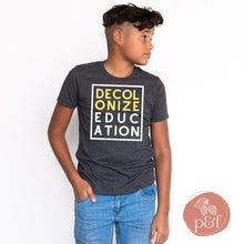 Load image into Gallery viewer, Decolonize Education Youth Short Sleeve T-Shirt | Paperbacks &amp; Frybread Co. - Paperbacks &amp; Frybread Co.
