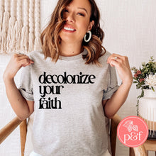 Load image into Gallery viewer, Decolonize Your Faith Black Lettering Shirt | Paperbacks &amp; Frybread Co. - Paperbacks &amp; Frybread Co.
