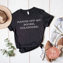 Load image into Gallery viewer, Hands off My Book, Colonizer. Banned Books Unisex T-shirt | Paperbacks &amp; Frybread - Paperbacks &amp; Frybread Co.
