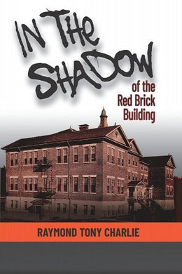 In The Shadow Of The Red Brick Building by Raymond Tony Charlie | Indigenous Residential School Memoir - Paperbacks & Frybread Co.