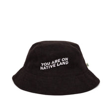 Load image into Gallery viewer, &#39;YOU ARE ON NATIVE LAND&#39; Black Corduroy Bucket Hat | Urban Native Era - Paperbacks &amp; Frybread Co.
